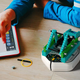 iRobot Root rt0 Coding Robot + Brick Top Bundle | $100 | Amazon